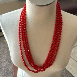 EUC 2 red beaded necklaces. Each Hangs at 30”.